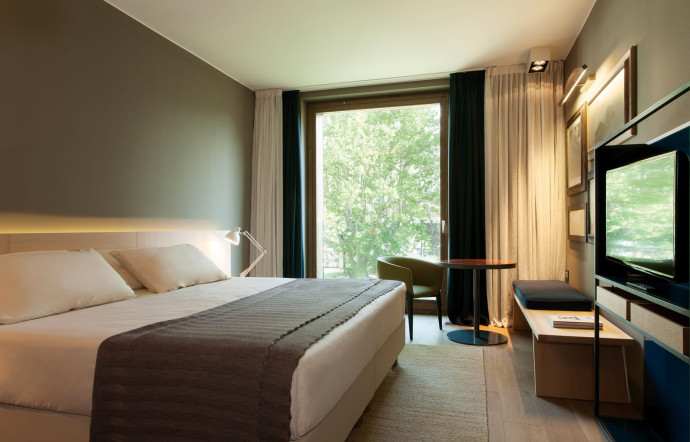 Les chambres ont un look minimaliste et sophistiqué.
